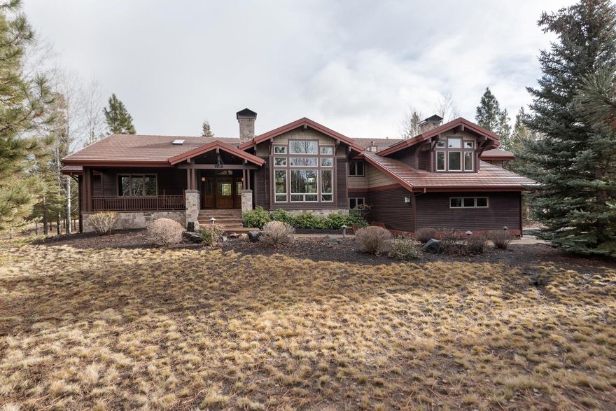 Built by renowned Norman Building & Design and situated on a wooded .77 acre lot in the exclusive Crosswater neighborhood, this luxurious 3,866 sf home features 4 bedrooms, 5 full baths and 1 half bath with bonus room, loft and elegant study. The open living room is adorned by a large stone wood burning fireplace and elegant cedar tongue and groove ceilings, which are also featured throughout. The primary bedroom is on the main level and includes a double-sided fireplace and heated bathroom floors. The large chef's kitchen is equipped with 2 ovens, 2 dishwashers, 6 burner Dacor range and tons of work-space. Amenities include 2 heat zones, 2 A/C units, 2 furnaces, humidifier, 2 water heaters, & 240 e-car charging in the garage. Sights and sounds of nature can be enjoyed from the large rear paver patio or front porch. Additional exterior amenities include a water feature, hot tub, and gas firepit. This is a very special Crosswater property with incredible attention to detail throughout.