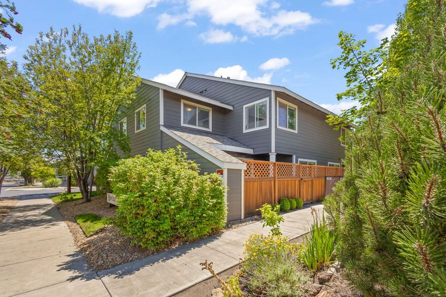 Turn Key! Unbeatable location in the heart of Bend! This updated END UNIT CONDO 2-bedroom, 1.5-bathroom offers the perfect blend of comfort, convenience, and style.  Can be sold with ALL of the furniture! Just steps from the Deschutes River, Pioneer Park, and downtown Bend's shops, breweries, and restaurants, you'll enjoy the best of Central Oregon living. Inside, you'll find tasteful updates including modern kitchen finishes, refreshed bathrooms, new appliances, and stylish flooring throughout. The open-concept living area flows seamlessly to a private patio—ideal for relaxing or entertaining. Upstairs, both bedrooms offer ample natural light and storage. With a well-maintained community, designated parking, and low-maintenance living, this is a rare opportunity for a full-time residence, weekend getaway, or investment. Live where you play—schedule your tour today!