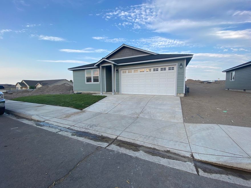 Brand new 3 bedroom home on a massive lot!! Room for RV parking!! 
Home comes with Granite counters, hardwood flooring, natural gas forced air with central A/C!
This home has a lot to offer for a small price!!
Looking for a home with room around it? This is it!!!