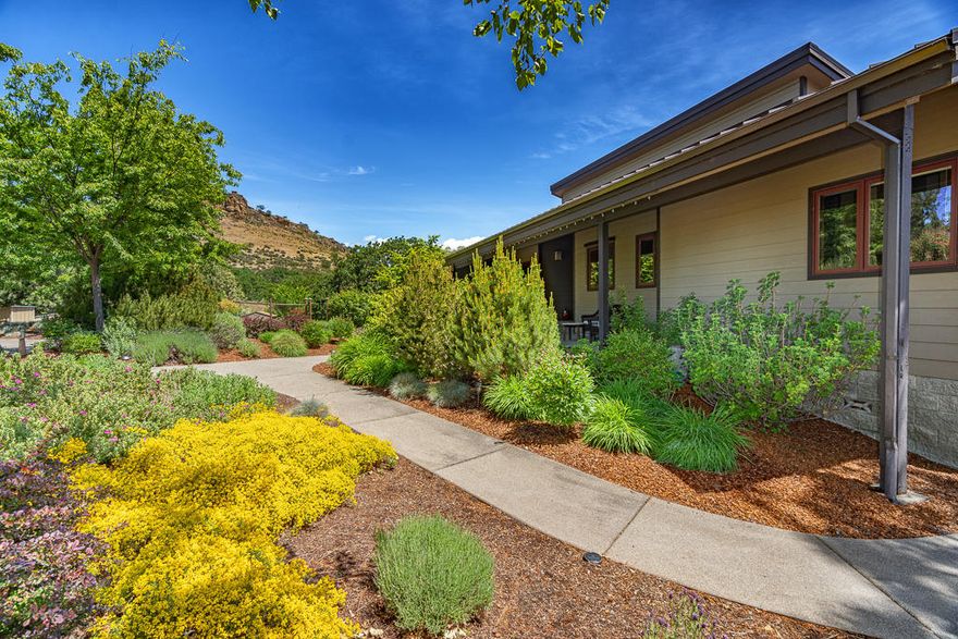 Simply gorgeous, one-of-a-kind property with spectacular views of Pompadour and the East Hills from the many windows and decks. Perfect location, minutes from downtown Ashland. This beautifully designed home has main-level living, making it ideal for most buyers. It has been newly remodeled in the past weeks with brand new hardwood floors and carpet; spacious chef's kitchen; new ''morning room'' and enclosed sun porch, both with fabulous light and views. The Master Suite has a new, custom, luxurious spa-like bath. There are gracious living and dining areas, opening to decks. Perfect for family or entertaining.  Downstairs is a separate guest/family area, with 2nd Master Suite, family or media room, another bedroom, second office, and third full bath. Spacious, covered decks beckon to the outdoors, and a finished 3-car garage for vehicles and storage. Solar power and TID irrigation dramatically lower power and water bills. Professionally landscaped with park-like grounds to enjoy!