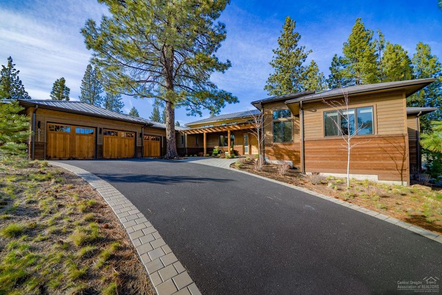 This incredible single level home in sought-after Tetherow fuses a rich NW modern palette with comfortable elegance and coveted privacy. The kitchen will delight any cook with high-end Viking appliances, double ovens, walk-in pantry, eating bar and separate prep island with sink. The voluminous great room with gas fireplace incorporates floor to ceiling windows for loads of natural light and wood ceiling beams provide discerning character. There are 4 spacious en-suite bedrooms with the enviable master suite boasting a second fireplace, direct patio access for morning coffee or soothing hot tub, oversized closet, walk-in shower, soaking tub and heated floors. Adjacent to common space with fairway views, the elevated lot provides a rare sense of privacy. Three-bay garage with epoxy floor. Enjoy westside lifestyle with a playground of hiking and biking trails, pools, fitness, golf out your door paired with brew pubs, shopping and other amenities close-by! Take virtual 3D Matterport tour.