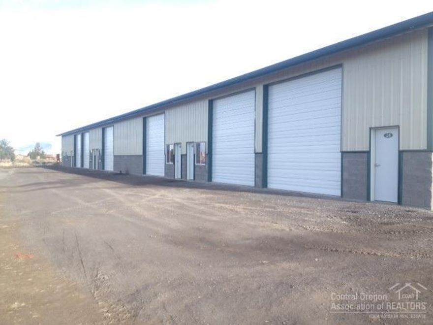 Quality industrial space located in the heart of Prineville Industrial park across from Facebook.  This unit contains a large paint booth...ideal for cabinet shop.  Space is divided up into multiple spaces...can be modified.  Two 14 ft. rollups and 3 phase power.