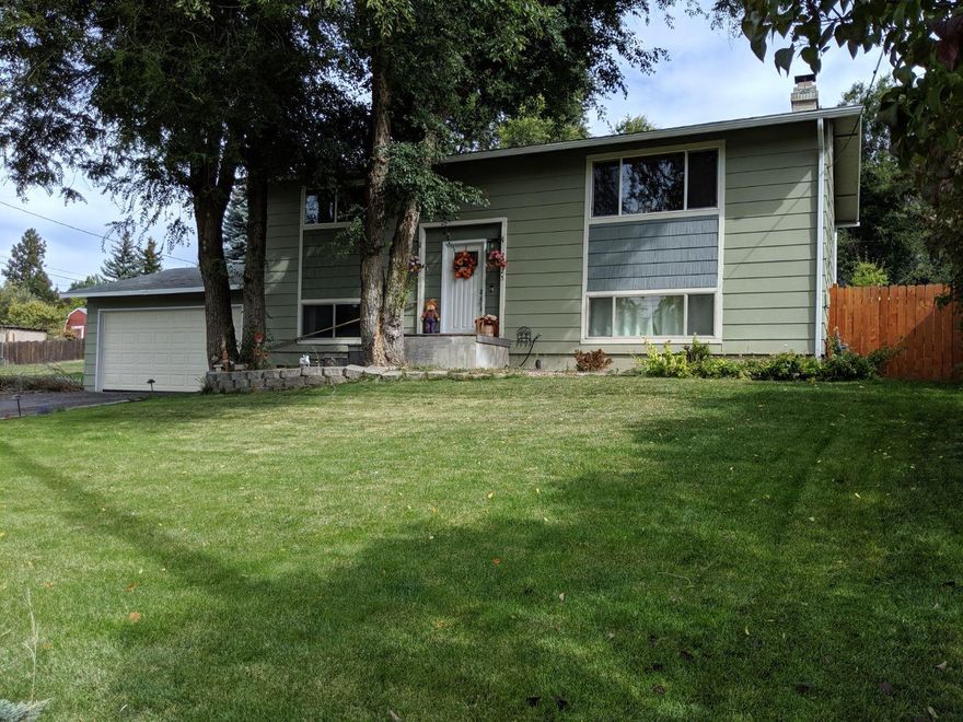 This property has been well cared for, and the pride in ownership clearly shows throughout the home! This super clean and updated 4 bedroom 2 bath home,is filled with upgrades! All appliances are stainless in the kitchen, and they all stay, including washer and dryer. The kitchen has a modern flare, boasting white corian counters with the built in one piece sink pairing nicely with the beautiful white tile back splash! Kitchen and all wet rooms feature nice tile floors, which transition beautifully to the wood laminate flooring, and with the immaculate carpet. Flooring is in outstanding condition throughout the home! The entire house has been painted recently, and the upstairs bathroom has been recently updated. The quality finishes inside the home, with all of the extra square footage, make this home a truly rare find! The back yard has ample space and features a newly installed brick patio as well! This home is a must see! Sale contingent on seller finding suitable housing.