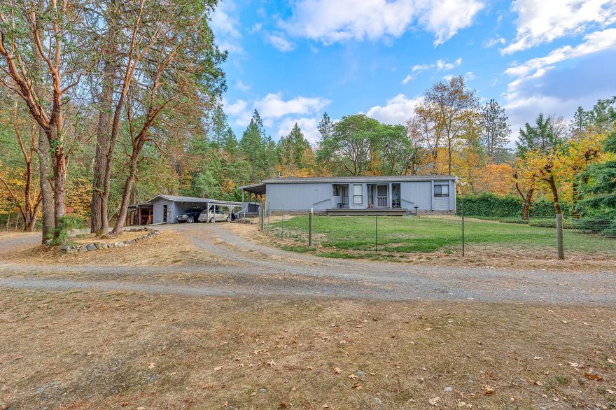 Jerome Prairie area with ow county taxes.  Perfect set-up for gardening, animals or great place to call Home.  Well kept manufactured home features a 2 bedroom plus a den.  Sunny and bright kitchen with newer appliances, pantry and an abundance of cabinets.  Great room with vaulted ceiling, cozy wood stove and dining area with bay window.  Master bedroom with dual sinks, garden tub and separate shower and bay window.  Split bedroom floor plan, heat pump and newer blinds.  Covered deck, carport, detached 1 car garage/shop, hobby stable and wood storage.   Nestled on 2.68 acres.  Established and fenced garden area, fruit trees; included apple, pear, plum and peach.  RV parking.   Convenient location close to shopping and hospital.  Put this on your list to show.  Septic replaced in 2003.