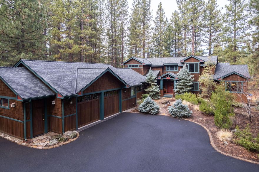 A serene getaway nestled amongst the great Ponderosa pine trees. You don't want to miss out on this rare river front property with walkway right down to Spring River. Gorgeous river rock double-sided fireplace with large great room windows overlooking the river. Newly updated kitchen with cherry and hickory cabinets, oak hardwood flooring throughout, and high-end appliances. Brand new roof. Extra large primary downstairs with sitting area and entertainment center, access the back patio through the primary and dining area. Exceptionally large office area and one extra bedroom downstairs. Upstairs features a loft/bonus area and two bedrooms. 
Come enjoy the mountains close by, take your kayaks down the river, fish off your own private dock, take a quick trip to downtown Sunriver, or enjoy quick access to the High Cascade Lakes. Then come back to your own private oasis on your back deck and enjoy your evenings by the fire pit area down by the river. You don't want to miss this rare gem.