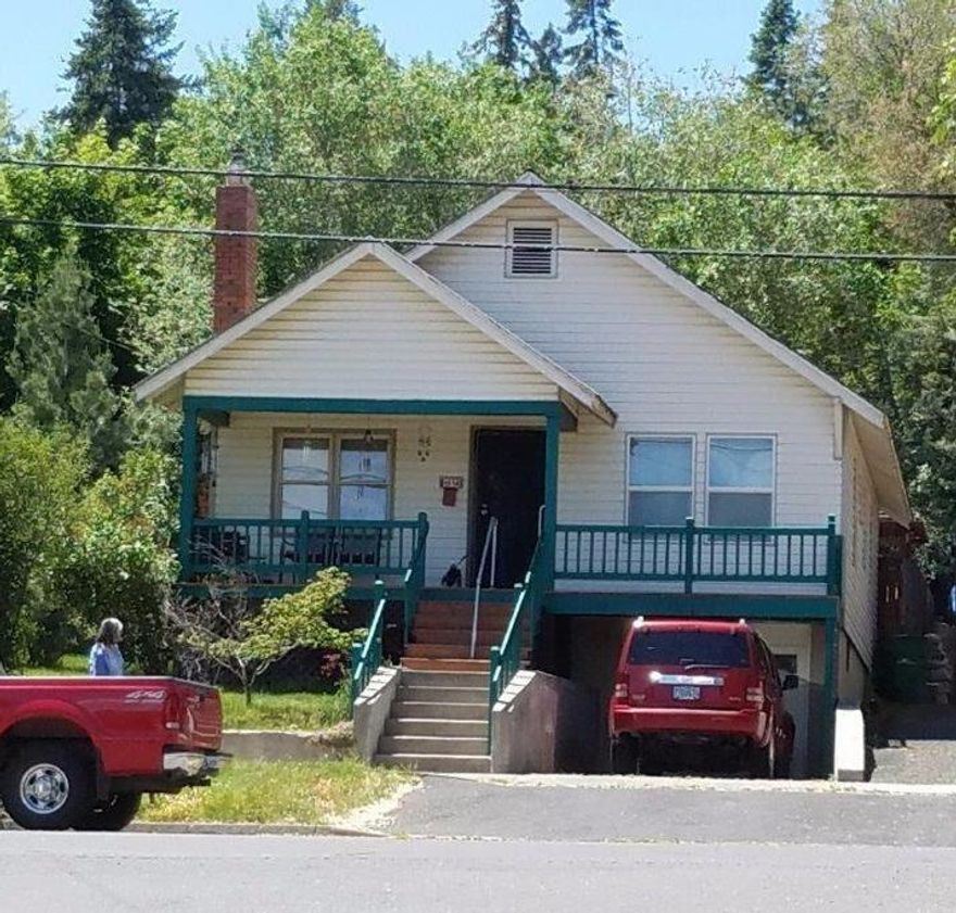 Starter home or rental close to downtown, OIT and hospital. Well maintained 2 bedroom/1 bath with a nice view off the inviting front porch. Low maintenance vinyl siding exterior. Hardwood floors, built-ins, upgraded vinyl windows and upgraded furnace. Laundry room with extra storage. Patio area in back yard and mature landscaping. 1 car garage with lots of storage and a cold room.