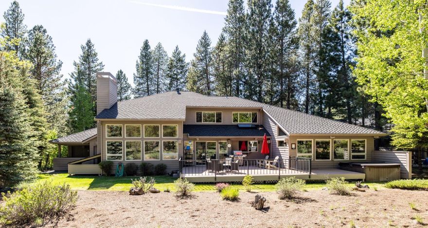 Spacious 5-bed, 3.5-bath Sunriver home with over 3,600 SF, ideally located within the resort and backing directly to National Forest land for ultimate privacy and a true Central Oregon feel. This well-loved home is perfect for entertaining, featuring an open chef's kitchen, expansive back deck for gatherings or quiet evenings under the stars, private hot tub, and a large main-level primary ensuite with adjacent professional office. Additional highlights include central vac, ample storage throughout, a 3-car garage plus dedicated garage-workshop area. Thoughtfully tucked away yet offering easy access in and out of Sunriver and close to resort amenities. Whether hosting guests or enjoying peaceful year-round living, this home blends comfort, functionality, and resort-style charm. A true must-see!