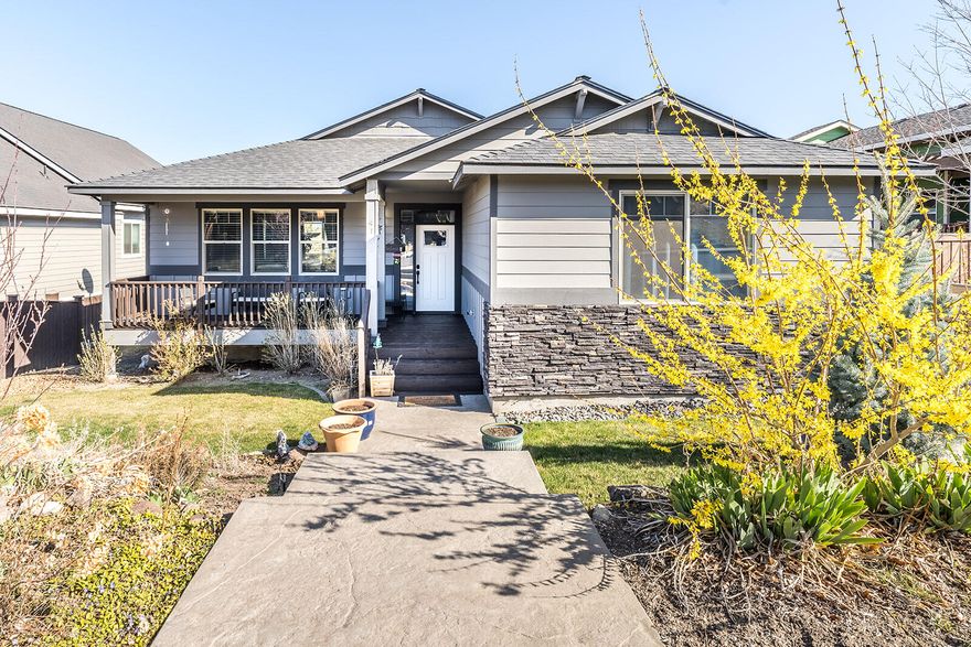 Gorgeous home with main level living in desirable neighborhood.  Enjoy mountain views from your back deck. Home features 3 bed 2 bath, and loft. Open living room with built in gas fireplace. Kitchen features large island, tile floors, granite countertops, stainless steel appliances, and full sized pantry. Large master bedroom with walk in closets. Master bathroom has double vanities, soaking tub and walk in shower.  All living is on single level, lower level is the oversized garage. Additional parking for a small RV or boat. Front is landscaped with sprinklers. Come check out this beautiful home.