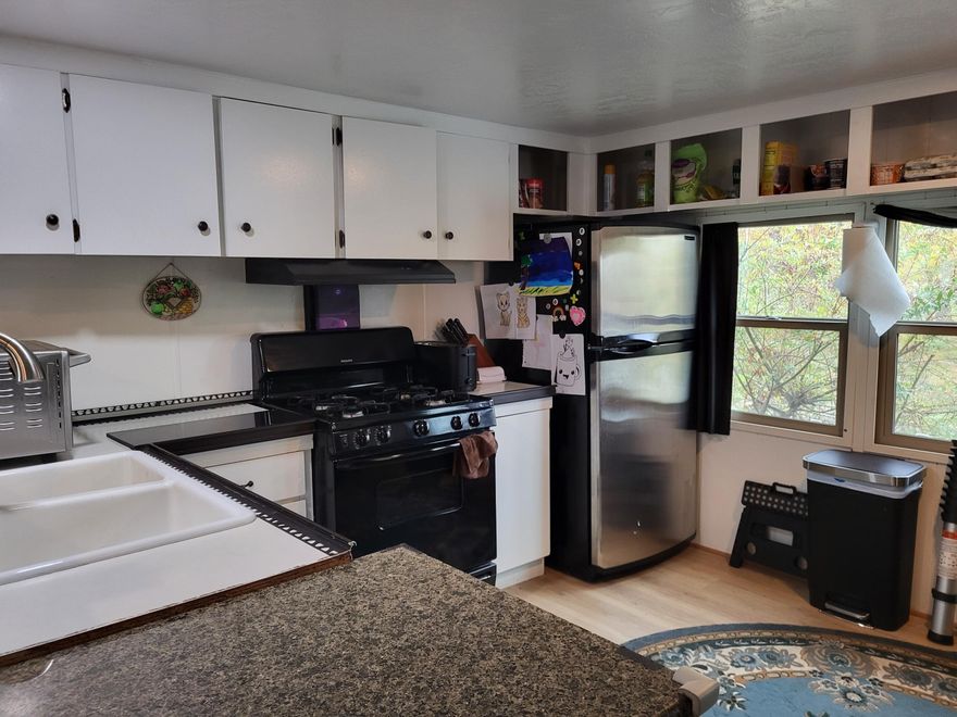 MUST BE MOVED!!!!
Rehabbed 2/2 with newly redone bathrooms, kitchen, ceilings, lighting and recent water heater new parts installation.  Washer, dryer, gas range, refrigerator and microwave included.
Tongue on.  Needs axels.  MUST BE MOVED