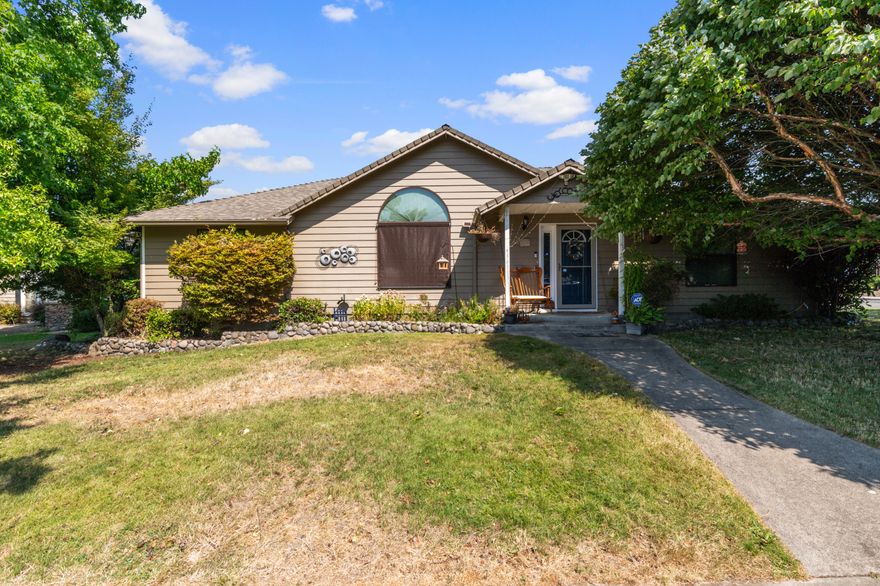 Beautiful Grants Pass home in a quaint neighborhood with a large lot and LOTS of recent updates - Interior was painted in 2012 and exterior done in 2016.  New granite countertops in kitchen, and bathrooms as well as on the windowsills were done in 2018,; Cabinetry has also been updated in the kitchen. New carpet in common areas and hallways completed around the same time frame. Low E windows installed in 2018 throughout the whole home, with new ducting and heating/cooling unit installed in 2019. Linoleum flooring in kitchen, bathrooms, and laundry room about 4 years old. Split floor plan with spacious bedrooms, and primary bedroom containing a large walk-in closet. Oversized 2 car garage with included storage shelves. Backyard features tons of space with a new patio/seating area with a fire pit recently built. Ring doorbell system included with the sale, easy transfer to buyer.  Don't miss out on this one, call/text Paris at (541) 210-2779 to schedule a showing today.