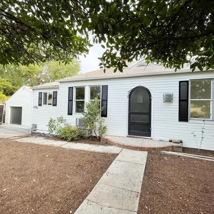 What a wonderful opportunity to own a classic East Medford home! This 1929 built cottage is Absolutely fresh, cute and clean! This home has been just recently updated and is ready to go! Curb appeal and location are at the top of the list of the great things about this property. The kitchen and living area is light and bright. Located just a couple blocks from shopping, healthcare and city services, it offers convenient access to life's necessities. The huge lot has all the potential you could ask for. The fully fenced backyard has plenty of privacy, with an Arbor and grapevines and lots of room to relax or entertain. Across the breezeway, part of the garage space has been nicely converted to a wonderful studio area that would make a great office, extra bedroom or could potentially be permitted as additional living space.