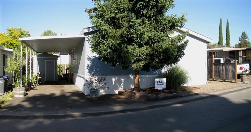 3 bedroom 2 bath double wide manufactured home with cute gazebo in back.