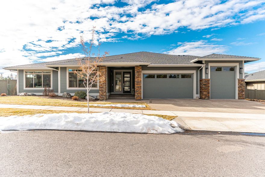 Absolutely stunning true single-level home on a spacious .26-acre lot in the sought-after River Vale neighborhood with peek-a-boo Cascade Mountain views. Step into a world of sophistication with this better-than-new residence reflecting the epitome of luxury living. Revel in the meticulously crafted upgrades, including a cabinet-finished Sub-Zero refrigerator, exquisite light fixtures, Hunter Douglas blinds, solar panels and so much more! Thoughtfully designed floor plan separating the primary suite for privacy. The butler pantry, complete with a wine fridge, adds an extra touch of elegance, perfect for entertaining. Efficiency meets style with a tankless water heater ensuring comfort and convenience. 3-car garage with finished Polyurea floors, RV bay and intentional landscaping including raised garden beds. Welcome home to a life of unparalleled comfort and elegance just minutes from the Old Mill and downtown.