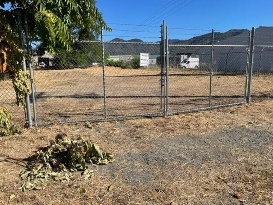 Looking for one of the last commercial properties to build/develop? This land can be a great location for Mini storage units or warehouse storage! Located in the SE part of Grants Pass, central to down town. Fully fenced with public water, power, sewer. Buyer to do your own due diligence as to what this BP zoning will allow.