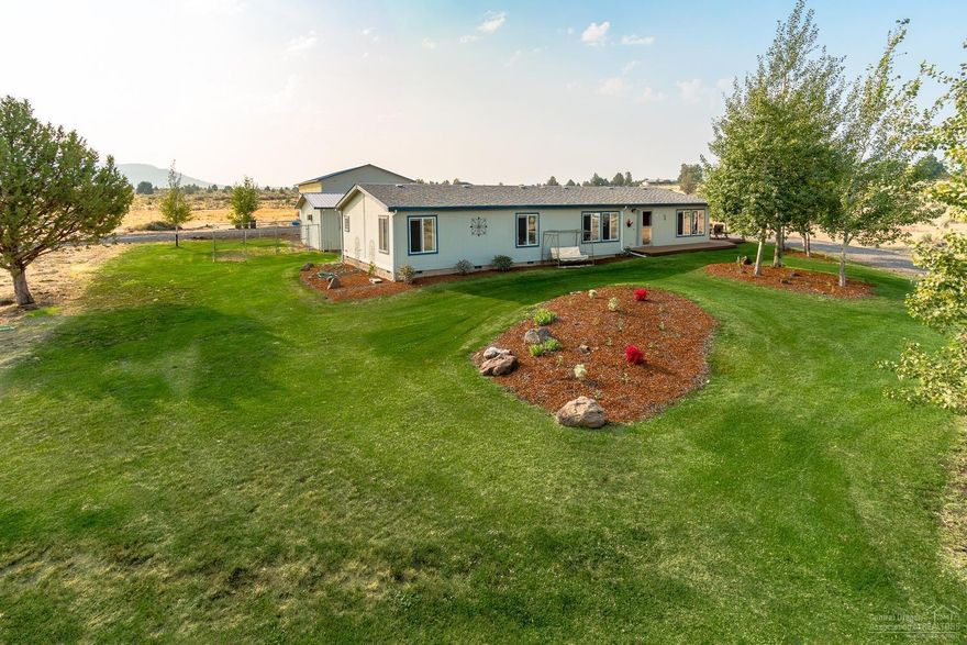 Imagine waking up to breathtaking views of the Cascade Mtns from your own piece of Central OR. House was completely redone in last 2 yrs w/NEW Hickory kitchen, copper sink, custom pantry door, flooring, interior paint, HVAC & more! Giant central island w/tons of storage & 80+sf of counter space. Open living space w/vaulted ceilings. Master Ste w/tiled walk in shower, lg walk in closet & Mtn View. Heated 36x48 SHOP w/openers, additional office building too! Extended garage w/Studio/Guest quarters. Don't miss