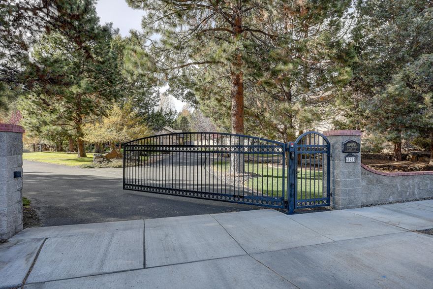 Open Houses 11/28 & 11/29 12-2. Beautiful, remodeled home on a gated 1.17 acres less than 5 miles to downtown Bend, medical facilities, and the Old Mill district. Coveted one level living featuring a 1-bedroom apartment with separate entrance. Could consider using as a short-term rental or secluded housing for guests. Thoughtfully designed interiors with comfortably-spacious private rooms and well-planned entertaining spaces, including a great selection of outdoor ''nooks'' for hosting guests in the spring and summer months. Gourmet kitchen with designer cabinet package and double ovens. Master suite features an oversized walk-in closet and a spa-like bath with a large soak tub. Located down the road from a local park, property also features a myriad of on-site outdoor luxuries, including RV parking with hookups, an insulated and heated workshop, a fenced ''pen'' for small farm animals or pets, two large storage sheds, a natural canal, and man-made water feature.