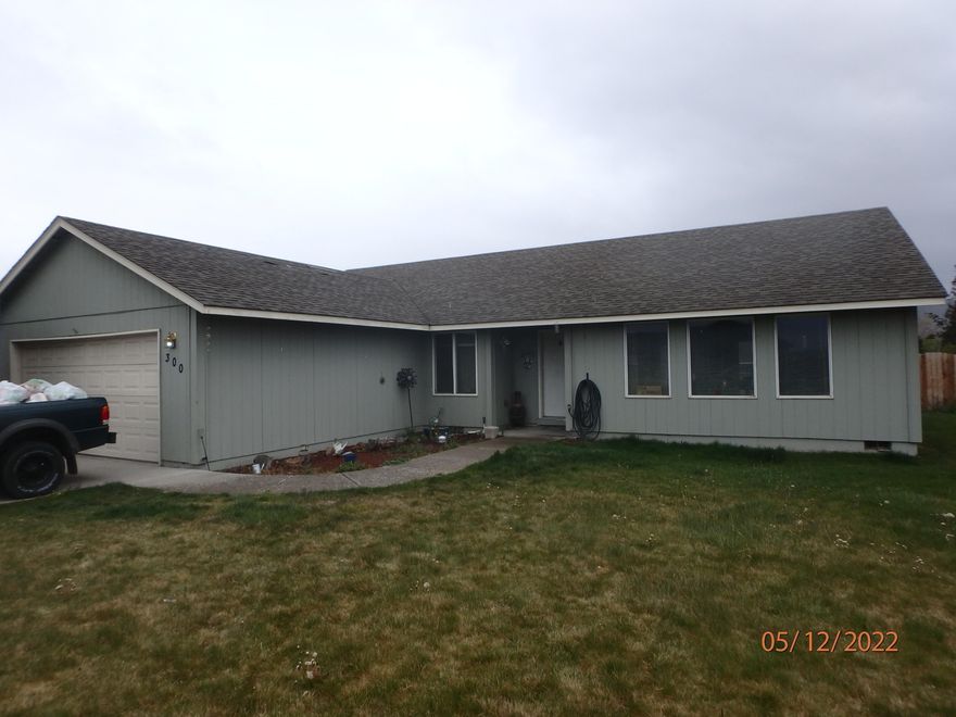 CULVER 4-bedroom home with 2 full bathrooms on one level, with 1,920 sq. ft. on a lot over 7,400 sq ft. on a corner gives you more room.  Get out of the hustle and bustle of the large cities today and own a home in the heart of the farming and recreation center of Central Oregon.    Only one block from the City Park playground, splash park, little league and more.  The driveway will hold an RV or boat, plenty of length.   Kitchen, dining room, family area and living room too.   The property is fully sprinkled for water and landscaping.    The Culver School District and Lake Billy Chinook all make this rare 4 bedroom or 3 bdrm & home office a rarity.  Only 15 minutes to Redmond, short commute through the farming country and 10 minutes to Madras, live in a small town yet be close to the larger cities for services and employment.   Lake Billy Chinook is only 10 minutes away for wake boarding, water skiing, fishing or relaxing on the beach.
