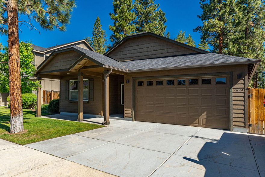 Be ready for adventure! Park your RV onsite with direct access to National Forest out of your own backyard! Located on 0.14 acres in the charming town of Sisters, OR, this inviting single-level home offers 1800 SF of comfortable living space. It features a great room with vaulted ceilings, 3 bedrooms, 2 full baths, an open floor plan, and an attached 2-car garage w/ epoxy floors. The primary suite includes a walk-in closet and en-suite bath with dual vanities, soaking tub, and separate shower. The kitchen boasts stainless steel appliances, ample counter space, breakfast bar, separate coffee/dry bar, plus a walk-in pantry. Outside, you'll find a landscaped yard with a raised garden bed, a storage shed, and a covered back patio w/ a hot tub that faces the forest. The dedicated RV parking space located behind a gated fence comes with hookups. Located just mins from downtown Sisters, you'll have easy access to shops, restaurants, and all the amenities this vibrant community has to offer!