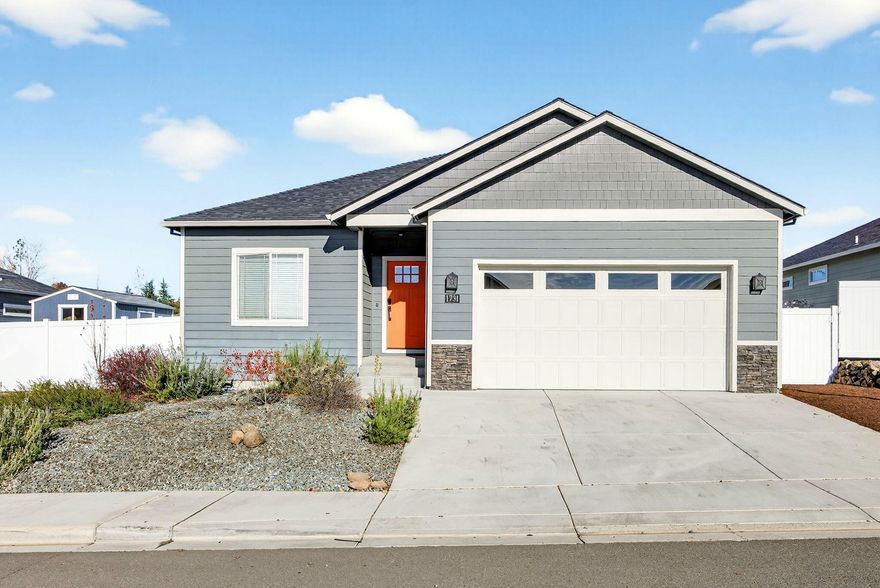 Welcome home to this beautiful, move in ready home! Enter to an open, light and bright living area that flows seamlessly into the dining area and dream kitchen. Quartz counters, island with eating bar, soft close cabinets, stainless appliances, pantry and gas range with convection. Two full bathrooms; primary with double vanity and large shower. Utility room (including washer and dryer) is conveniently adjoined to the primary walk-in closet.  Easy care vinyl plank flooring in living area and primary bedroom, tile in bathrooms, and carpet in two bedrooms. Nine foot ceilings, ceiling fans, mini-splits, tankless water heater, digital front door keyset, fully finished and insulated garage, backard covered patio, timed sprinklers and vinyl fencing, all located in a great northeast neighborhood.