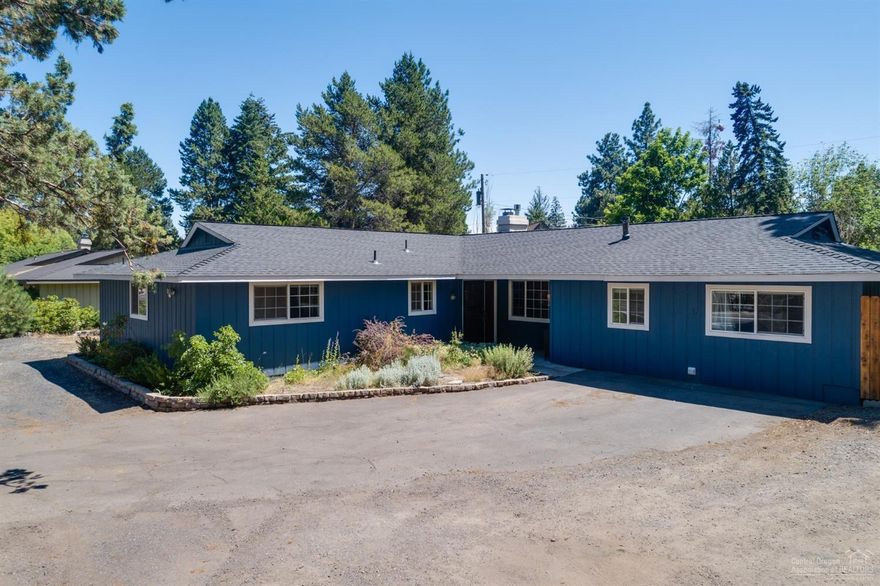 This home features newer kitchen and bath, newer roof, paint, windows, on over a third of an acre of beautifully treed lot in Bend's desirable midtown! Very much a gardener's delight. This is perfect for multi generation living or possible income property. Room for multiple toys. No HOA