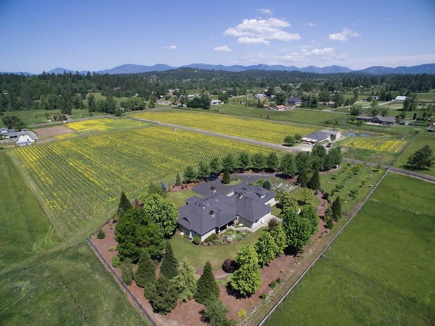 Amazing Opportunity! Located just outside of Grants Pass, OR. The Crow and Bear Winery is ready for the next step! With over 8.5 acres of prime, established vineyard, the 17+ acre property is a wine lover's dream! The gorgeous 3649 sq. ft. home has 4 large bedrooms, 2.5 bathrooms, den, massive chef's kitchen and an amazing outdoor living space. The custom tasting room can accommodate up to 100+ people for all your wine tasting events. Fully fenced with room for expansion, irrigated from GPID and two ponds, asphalt driveway and automatic security gate. Huge equipment storage building to hold the farm's essentials. The finished and heated 3 stall garage is a woodworker's paradise. There is simply too much to list for this one of a kind property! This is truly a must see property in a must have location!