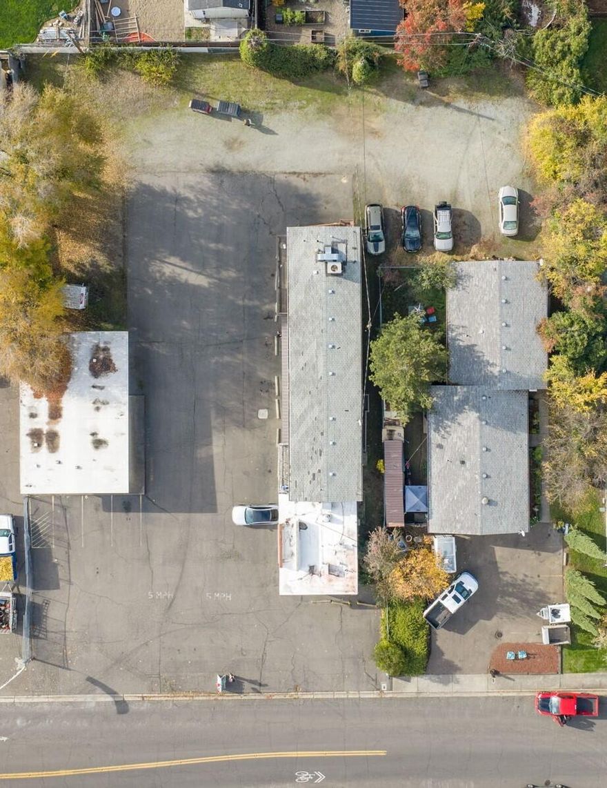 Great location large .48 acre lot zoned Medford C-C offers a ton of possibilities. 3 commercial spaces. 2 of the spaces are currently vacant, the 3rd space has been occupied by a long-time tenant (over 20 years). 2 upper-level apartments each are 2 bedrooms, 1 bathroom, 702 SQ FT. 1 of the units has been recently updated with new flooring, paint and appliances. The zoning and size of land offers potential for additional development (Buyer to do their Due Diligence) Neighboring property with a Duplex also listed for sale.