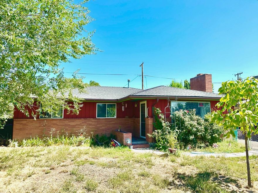 This house is centrally located in Klamath Falls and is close to shopping and public transportation. With two living spaces, there are so many ways to utilize the converted garage: workout room/home gym, Large office, giant playroom, home theater, sports den, game room ...or even turn it back into a garage. The main living room is just off the kitchen, and is large and comfortable with a fireplace and large inviting with a large picture window to let in natural light.  this three good sized bedrooms share the bathroom that has a shower tub combination and lots of counter space. Outside you'll find a fenced front yard, a fully enclosed backyard that has a very nice shed for additional storage. Please make your appointment today to see this well priced home