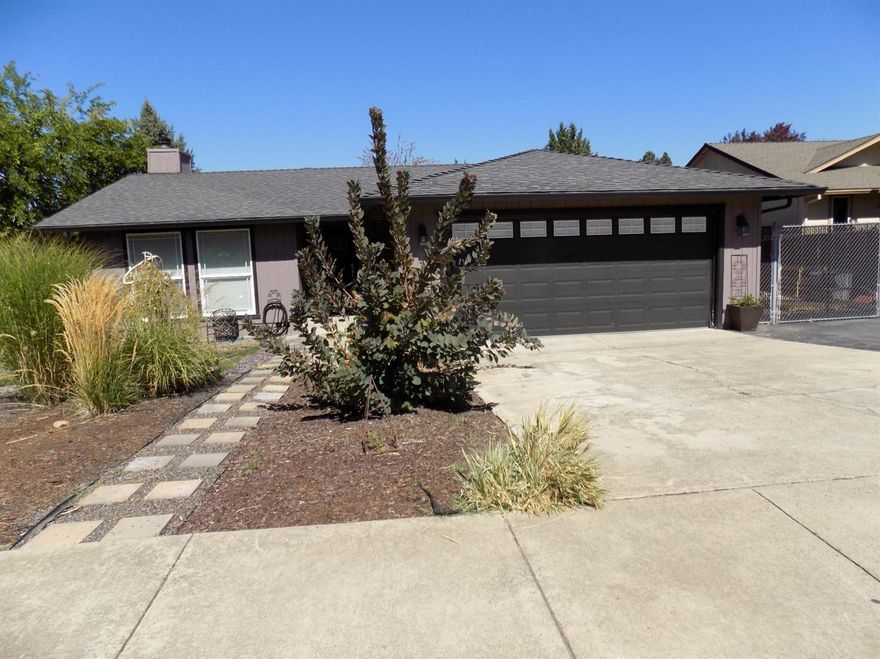 Gorgeous home in very desirable Lone Pine school district. Beautifully remodeled gourmet kitchen - hickory cabinets, stainless steel appliances with 5 burner Elite gas stove, breakfast bar - need I go on? Stunning hardwood floors throughout with huge windows in the living room to let in the natural light. Both bathrooms have been beautifully remodeled with marble tile and custom sinks. All this and RV parking too! Come take a look today!