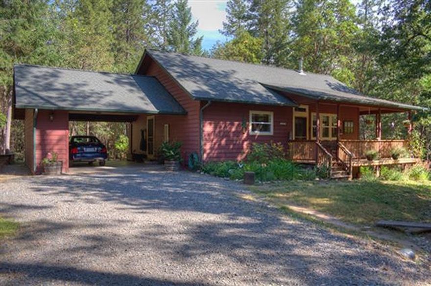 Charming and Attractive Newer Home with Outstanding Horse Facilities in a Private & Quiet Setting! This 'Chalet in the Woods' Home is located in a Desirable Area in the West Hills, and is set well back off the road. Home offers a Light and Open Great Room Design, Beautiful Wrap-Around Covered Porch, and is just perfectly designed for the Setting and Property. The Horse Facilities offered here really make this Property shine. The Property is Fenced and Cross Fenced, complete with a Pasture Area, Engineered Paddock, Turn-out Areas, and Direct Access to 400 Acres of BLM with Trails right out the back door. Like the other facilities, the Two-Stall Barn is immaculately kept. Other amenities include a 960 Sq Ft Shop Building, Fenced Established Garden, and Fruit Trees. Beautiful & Level Property offers a nice mix of Trees and Open Space, plus a Seasonal Creek. Seller currently operates a Dog Kennel out of the Shop Building, and it is set-up ideally for this if a New Buyer wishes to continue!