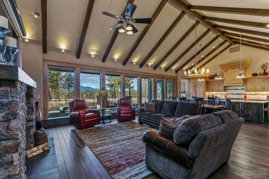 Enjoy majestic mtn views, hiking trails, shops & eateries w/the convenience of living near dwtn Bend & just mins from Shevlin Park. Located Bend's NW Side, & built by Artisan Homes & Design, this Structural Concrete home beautifully partners quality craftsmanship, energy efficiency, & long-term value. Benefits of this proven method of construction incl. low maint, superior fire & storm protection & enhanced air quality. This single level custom home features hdwd floors, vaulted ceilings, exposed beams, hand trowled plaster walls & floor-to-ceiling windows. Soak up the views from your backyard on this premium lot, & also from great room & the custom kitchen w/granite counters, double-ovens, SS appl & easy access to covered patio w/ built in BBQ & fire pit. BDs are well separated & boast ensuite BAs w/in-floor heating. Spacious mstr suite is highlighted by oversized windows & generous closet space. Mstr BA incl soaker tub & walk-in shwr. All this plus an oversized garage w/separate shop