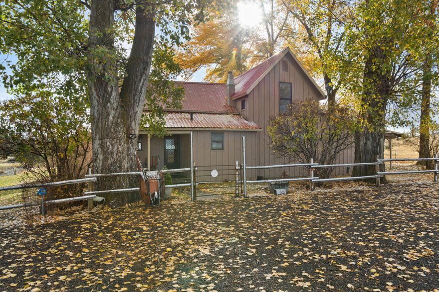 Your very own home on the range! This charming home was built in 1900 and is ready for it's new owner to take advantage of the charm and gorgeous surroundings. This home does need someone to give it some love. Surrounded on all sides by private cattle property with a seasonal creek. You will be hard pressed to find more privacy than this homestead can provided! Call your favorite agent today to see this wonderful property before it's gone!!