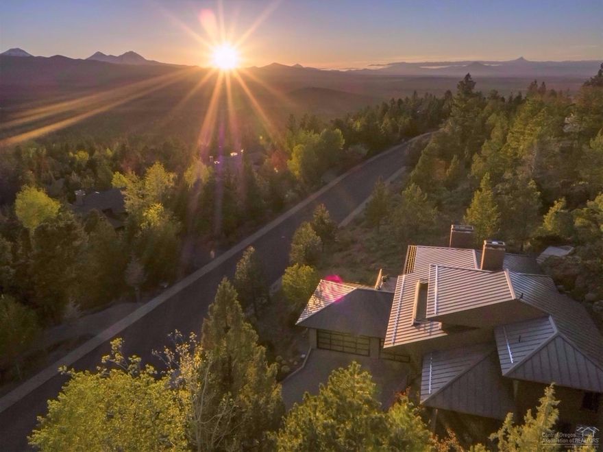 Artfully designed gem high on Awbrey Butte celebrates the Bend lifestyle with panoramic views of the Cascade Mountains. Perfectly private setting nestled into the hillside amongst the boulders of an ancient lava flow offering the best of indoor-outdoor living. Gracious entry welcomes you to an exceptional home styled with sumptuous selections of exotic woods and stone finishes throughout. Open Great Room concept, wholly private Master Suite, large Guest Suites and Den or 4th bedroom. Heated paver driveway.