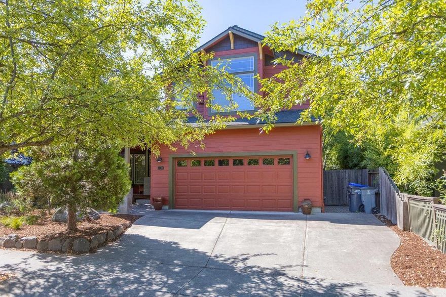 Beautiful home & location in Ashland Village w/gorgeous private backyard, all fenced, private front yard w/mature landscaping and relaxing covered porch. Lg vaulted ceilings in living rm & formal dining rm; hardwood floors in living rm, dining, kitchen, hallway and breakfast rm. Stainless Steel appliances, granite counters in kitchen that opens to breakfast rm and family rm. 2 good size patios in backyard. Gas log fireplace w/slate tile in living rm plus dbl-sided gas log fireplace in Master Suite w/vaulted ceilings, 2 walk-in closets, DBL sinks, soaking tub, nice Travertine shower, water closet, tile counters & tile floors. 2 guest rooms, one w/built-in desk, Guest bath for both w/tile tub/shower, tile counter & tile floor; half bath with tile floors downstairs. Great floor plan in an area of nice homes and close to downtown Ashland. One listing agent is related to the Seller.