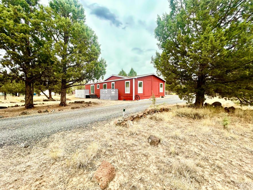 Come see this comfortable home situated on 2 peaceful acres just minutes from Prineville Reservoir. Located on a quiet road, this property offers privacy, room for your toys and tools and endless potential. Several outbuildings and sheds add to the livability of the property. The home is being sold as-is, a great opportunity for buyers looking to invest or personalize their own rural retreat.