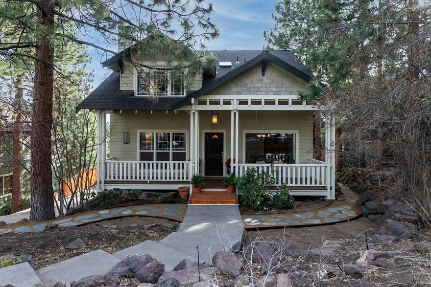 Rare find in prime Westside Bend location! Fabulous custom home located in the desirable Golden Butte neighborhood in the heart of Bend! This 4BR/3.5BA home features a dream chef's kitchen with cherry cabinets, granite counters and walk-in pantry. Beautiful quality hardwood flooring and woodwork throughout. Upstairs: Primary Suite w/ private balcony, 2 additional bedrooms and full bath. Downstairs: Private Guest Suite has a full bath, kitchenette, radiant floor heat and its own entrance. Garage is set up w/workshop space and plenty of storage. New roof in 2019 w/heat pads installed. Enjoy space and tranquility on your private .26 acre south facing, fully fenced backyard w/established fruit trees and raised garden beds. Walk or bike to schools and Westside amenities. Home is STR eligible per City of Bend.