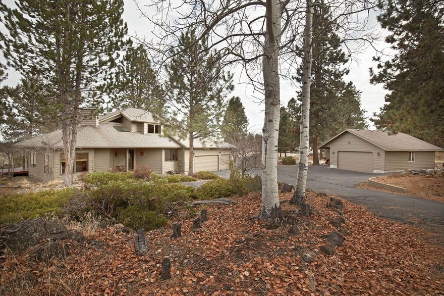 3/3 Custom Home on 2.21 acres with additional 900+ sq ft detached Office/Multipurpose heated building and 3 car garage. The house has all hardwood floors(tile in baths), 10 foot ceilings, granite countertops, HVAC, sky light, jetted tub, LED lights, decks, jetted tub wood burning fireplace. Wired for generator. The detached finished/heated building can have many uses including an office, gym, or studio. It has 10 foot ceilings, 100 amp service, epoxy floors, windows, a large 8 foot double garage door and can accommodate a full bath. There is also RV parking. Enjoy the huge Ponderosa pines, rare Manzanita bushes and , the deer and quail. Maintenance of the property is actually fun...Really! It's xeriscapes so you don't have to water or cut grass. An irrigation canal is on one side and views of the Ochocos Mountains on the other side. It is only minutes from shopping, downtown Bend and the new high school. Preapproval Letter or proof of funds required for home showing.