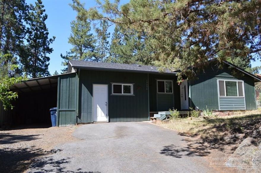 Bring Offers! New roof in 2010, all windows updated to efficient vinyl in 2012, Pergo laminate flooring in living room is just one year old, all fixtures replaced in bathroom in 2009 including sink, tub, shower surround and toilet, new certified wood stove in 2006. Large lot provides plenty of separation from neighbors and more privacy than many lots in Bend. Located on dead end street with very little traffic. Easy access to parkway and short drive to Old Mill.