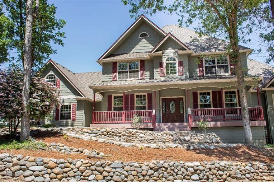 Builder's custom home located in a great country setting. Enter the home through red oak hard wood floors with a tiled inlay. This well designed 4 bedroom, 3 bathroom home sits on a nice knoll over looking a 1152 square foot shop. Home offers recessed lighting with plant shelves, wrought-iron stair case, dual heat system, wired for surround sound, 2 dining rooms and a breakfast nook. Master en suite has jacuzzi tub and dual head shower. Kitchen is open to large open family room, granite counter tops, stainless propane convection oven and cherry stained cabinets. Enjoy the large deck leading to a garden area, pool and private back yard. Antelope Creek borders the east side of the property. You will not be disappointed in touring this one. Very private and peaceful.