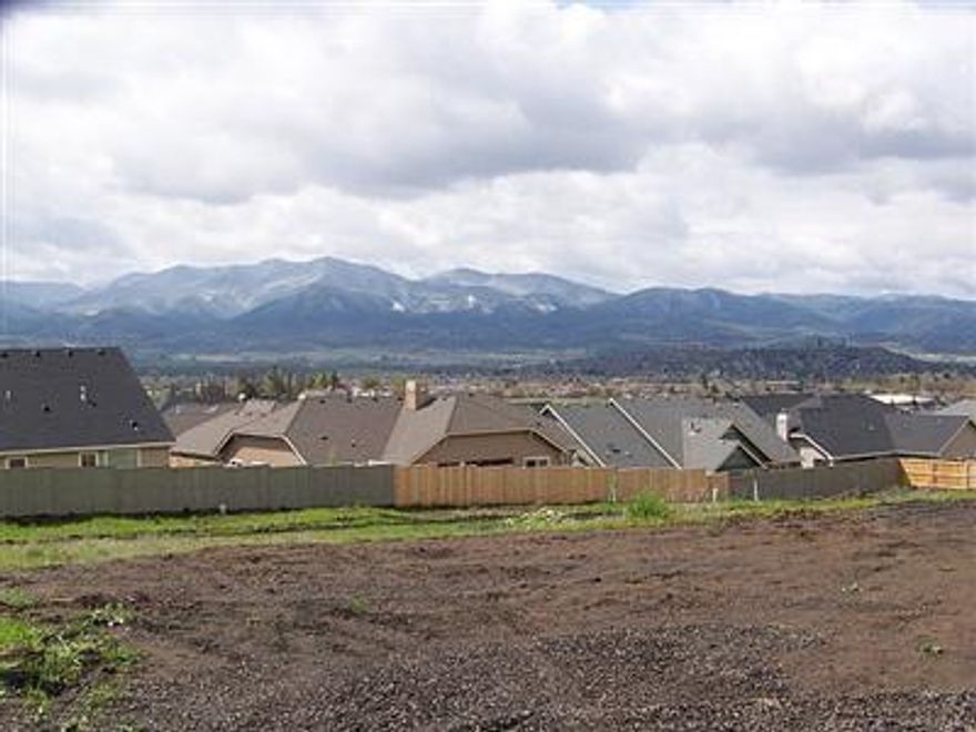 Spectacular large view lot in beautiful Summerfield. South East Park Phase Seven. The gorgeous improved lot has outstanding mountain and valley views. The lot would be ideal for a custom home with a daylight basement. Located in a neighborhood of fine properties. Close to Rogue Valley Country Club, hospital and shopping. Bring your plans and your builder and start your dream house.