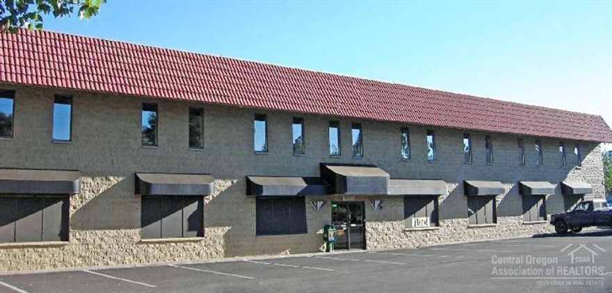 The Spectrum Executive Suites building is a professional office building. The building is an all Concrete Molded Unit (CMU) block structure with a new roof and HVAC systems. The property includes 30 parking stalls located on both the north and south sides of the premises. The two story building totals 14,900 rentable square feet with 26 tenants currently occupying 28 of the 31 suites. The property includes a shared conference room, multiple office suites, and sits on a 0.48 acre (20,908 SF) taxlot.