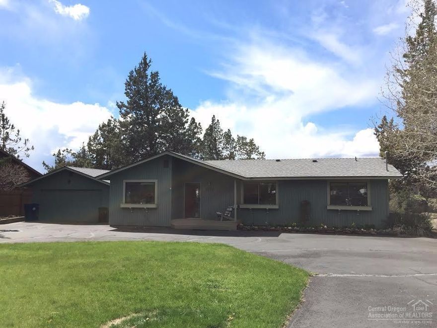 On the Canyon sits this 3 bedroom home with den, 1718 sq.ft of living space, plus a double car garage. Huge .53 acre lots. Very unique parcel that goes from the street down below and includes a lot in the bottom of the Canyon. The home has an abundance of cabinets in the den, Great room is open to the Dining room. The kitchen has access to a large back deck. Lots of seclusion with tress, rock wall, and shrubs. All the bedrooms are nice size, with a huge master that has a shower and plenty of counter space.