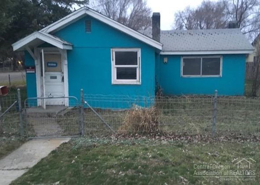 Cute 2 bedroom home on a nice corner lot, ready for some new character.