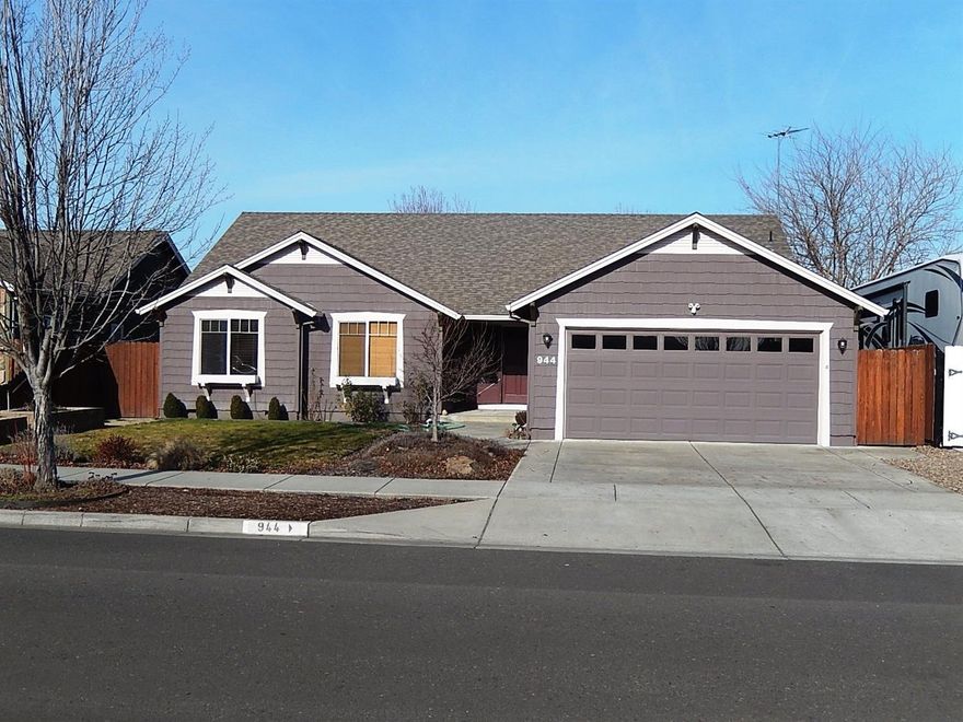 Don't delay in being the first one to put in an offer on this wonderful home! Located in exclusive Hampton Place Subdivision. Large & Open Great Room Design with Vaulted Ceiling & Shelving. Stunningly beautiful hardwood flooring throughout main living area & hallway. Kitchen has tons of solid wood cabinetry. Island houses the High-Quality NXR Gas Range/Oven with Specialty Hood & also provides a Breakfast Bar. You will love the Huge Walk-In Pantry! All beautiful Stainless Appliances. Gorgeous Lighting Fixtures. Nice Laundry Room with additional storage. Spacious Dining area with easy access to the covered Patio. Cedar Privacy Fencing & In-Ground Sprinklers both Front & Back. Beautiful Water Feature. Large Master Suite with Vaulted Ceiling & Giant Walk-In Closet. Also convenient Slider that leads to the covered Patio. Back Yard is just the Right Size! Fenced area at East side would be the perfect dog run! Park your longest truck in this over-sized garage!