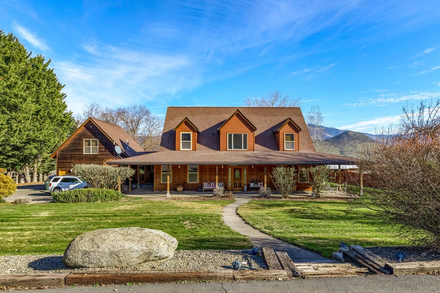 Unique Opportunity for a wonderful, close-in rural Ashland property. This well-appointed home features 3 bedrooms plus an office, 2.5 baths and 2,932 SF. There is a main level owners suite with spacious bathroom and walk-in closet as well as an office and addtn'l full bath. Upstairs are two more oversized bedrooms + a full bath. Hardwood floors throughout much of the primary living spaces, granite in the kitchen. Vaulted great room with gas fireplace, incredible natural light and expansive views. Just under five usable acres with amazing outbuildings; 600 + SF two car attached garage with bonus room over top. Need room for your toys? Don't miss the heated and cooled detached 1,008 SF RV garage with adjacent 288 SF one car garage/storage room + additional 576 SF workshop/office space as well as a half bath. Incredible work from home set-up. Plenty of space for animals, gardens, toys, hobbies and more.