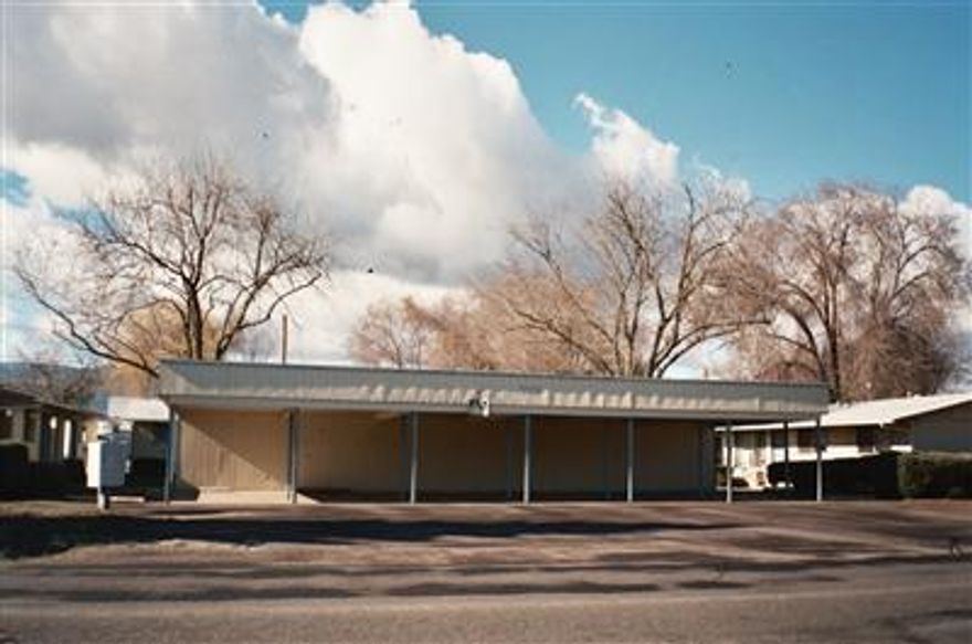 Six units situated in three duplexes with extra storage & carports. The units have a mix of fenced back yards, patios, central grassed common area & more. New roofs, gutters & paint in 2006. These tidy, bright, & clean one level rentals are all 3 bedrooms, 1 bath with laundry hook-ups & wall air conditioners. Check possible owner carry.