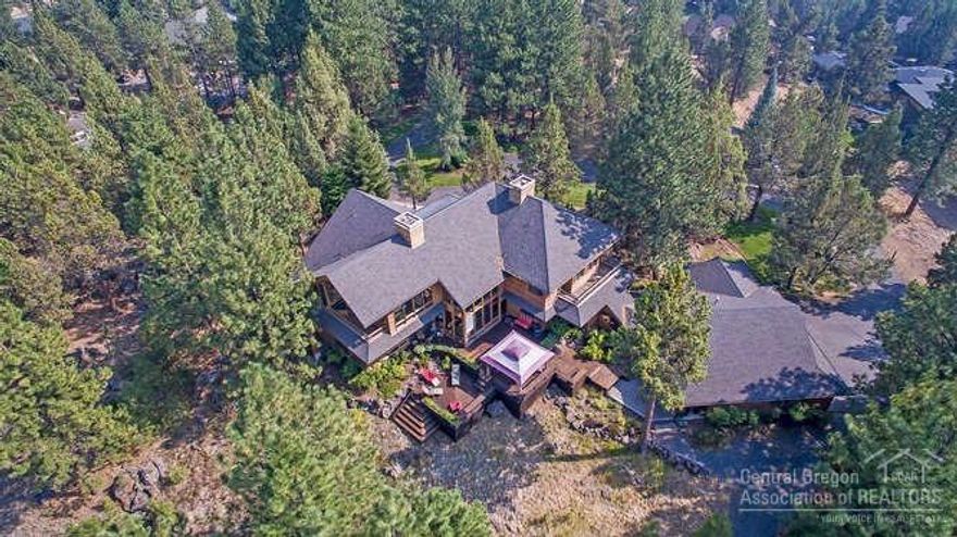 Bend's last large NW estate parcel, developable. Retain in present state for a close-in westside location in a private, beautifully treed setting w/some Cascade Mtn views. Or develop for fantastic, sgl-family homesites--or both! Zoned RS for std density in City. Very unique & stunning custom home, sold as-is. Buyer responsible for all due diligence re: development. City of Bend Water & Sewer Analysis completed for up to 31 lots (attached). Rare opportunity & last of its kind! Sellers may be open to creative financing for qualified buyer. See prospectus attached, CLA for details.
