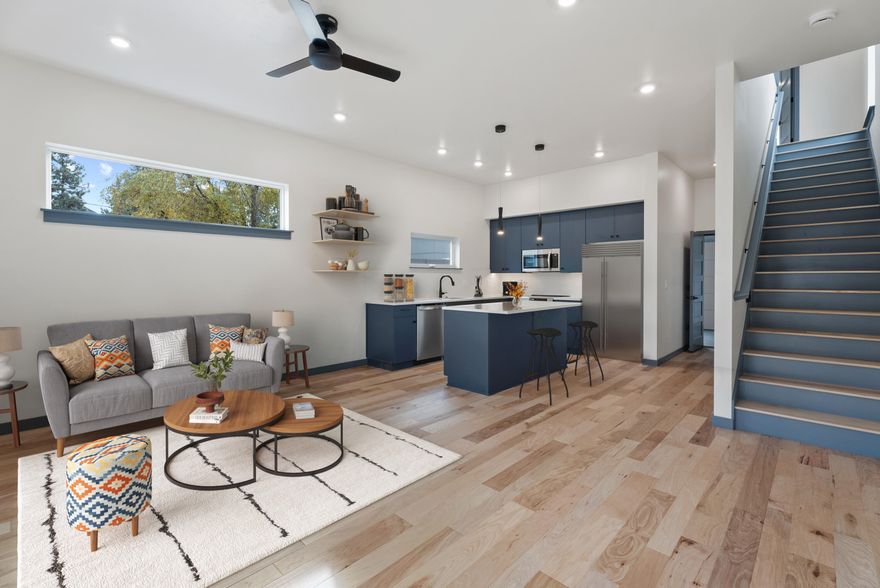 Just around the corner from Bend's iconic Old Mill District, this move-in ready, new Hiatus home, designed by 2024's High Performance Builder of the Year, offers exceptional design and an unbeatable location. Inside, vaulted ceilings and expansive windows highlight quartz countertops, stainless steel appliances, custom cabinetry, and engineered hardwood floors. Bedrooms are true dual primaries, each with its own ensuite bath. Net-zero ready, this home scores 10/10 HES and includes advanced insulation, fiberglass windows, a durable metal roof, efficient mini-split heating and cooling and an EV-ready garage.