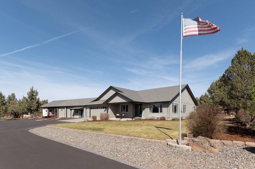 Private country home w/detached 1,110 sqft shop which includes a 300 sqft finished office/mancave. All situated on a 4.68-acre parcel, of which 2.44 is irrigated. Property backs to BLM. Light & Bright home with west-facing sunset mountain views. Livestock pasture is fully fenced & cross fenced. Beautiful deer fenced garden with raised beds and drip system. Rustic she shed and poultry coop make this home a CO jewel. Close in only minutes to Redmond and Deschutes River.