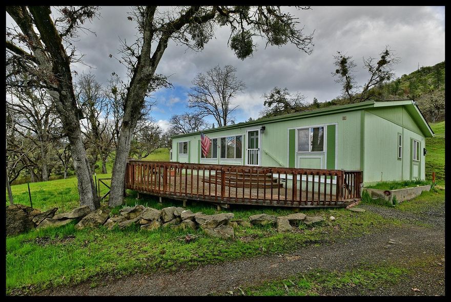 This hard to find property will not last long! Situated on over a half acre, this home offers 3 bedrooms, 2 bathrooms and has a detached oversize 2 car garage/shop and a large storage shed. There are lovely views from the home and it sits back from the road just enough to offer a bit of privacy.