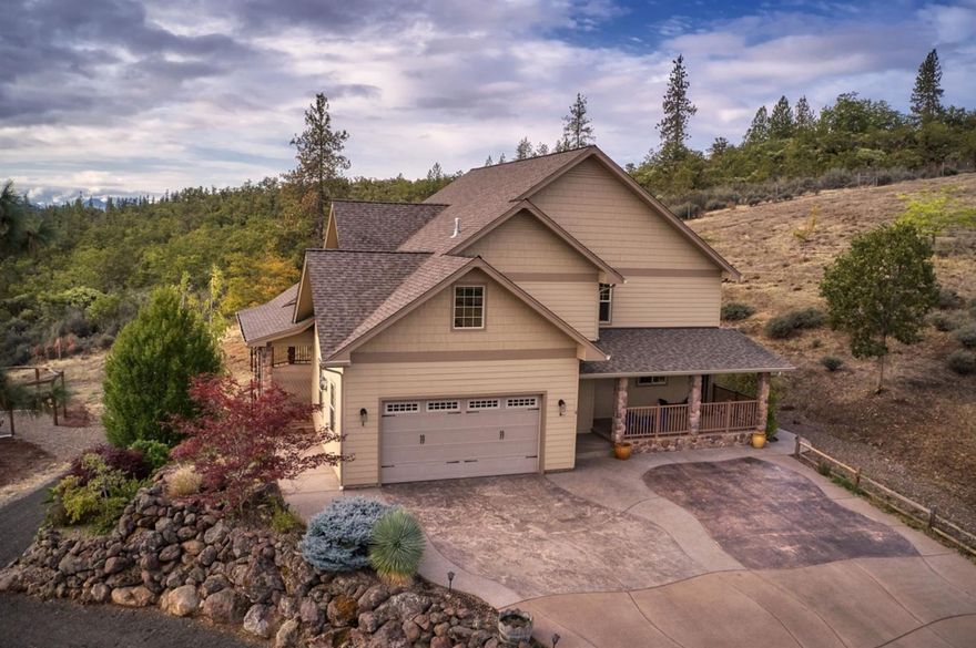 Welcome home! Rural Oregon living at its best. Situated on 7+/- acres this quality built custom home offers views of the surrounding mountains and pasture lined valley. The 3 bed/ 3 bath home features a spacious living area of 3151 square feet with plenty of storage and a daylight basement which could serve a variety of uses. Along with an attached two car garage there is a 40X50 shop designed with tall roll up doors at each end allowing one to pull all the way through. Parking and access is enhanced with the circular drive. Constructed in 2006 this home has all that one would expect from a custom build. From its spacious design with a main level master suite to high end flooring and finishes, this home is sure to please.